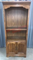 BOOKCASE CABINET W/DOORS AT BOTTOM