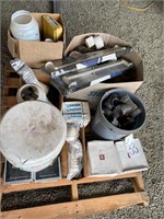 Pallet of misc plumbing supplies, clamps, PV pipes