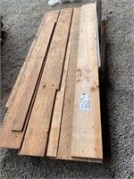 Stack of misc size lumber, various sizes