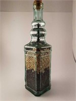 Decorative bottle with seeds.