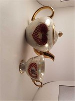 Teapot and matching teacup.