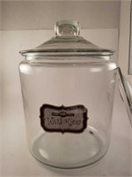 Glass jar with an extra lid.