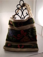 Yarn decorated bag.