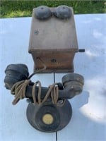 Early Bakelite telephone with wood ringer box