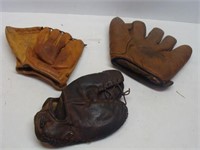 Three Antique Baseball Gloves