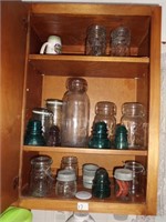 CONTENT OF CABINET OLD JARS, INSULATORS AND MORE