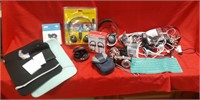 Headphones, digital camera, mouse pads, misc cords