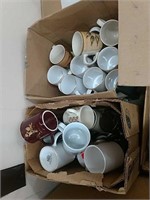 Two boxes of coffee mugs