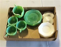Lot of green and white dishes