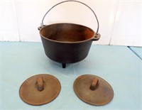CAST IRON 3 FOOTED POT & (2) SMALL CAST IRON LIDS