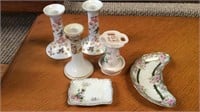 Three candlesticks, toothbrush holder, two dishes