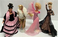 Four Barbie Dolls