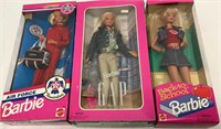 Three Boxed Barbies