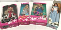 Four Boxed Barbies