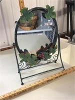 Oval mirror on metal stand
