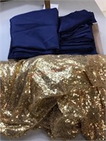 Blue tablecloths and gold sequin fabric