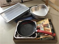 Baking pans, skillet, books