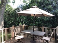 GREAT PATIO SET.  TABLE WITH 4 HEAVY CHAIRS AND