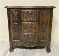 Exceptionally Carved Serpentine Front Cabinet.