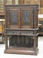 Neo Gothic Tracery and Rosette Carved Oak Cabinet.