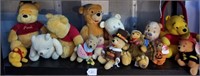 Shelf Full Of Various Winnie The Pooh Bears #2