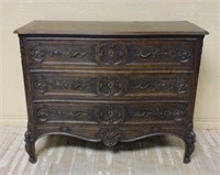 Finely Carved Louis XV Style Oak Commode.