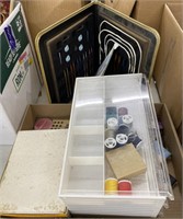 Assorted sewing and needlework supplies