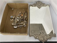Collectible spoons and vanity mirror