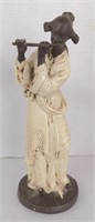 Statuette woman playing flute