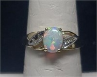 10K Simulated Opal with Diamond Accents. Size 7.