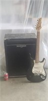 Behringer Amplifier and Cresent Guitar