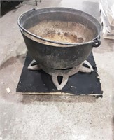 CAST IRON POT AND STAND  - 26" ACROSS  - HAS
