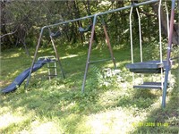 old swing set with slide and porch swing
