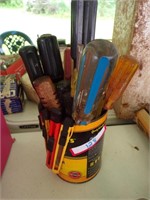 can of screwdrivers and razor knives