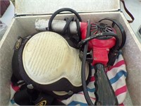 Deluxe heat gun and knee pads in trunk