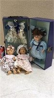 Doll with case and 2 other dolls
