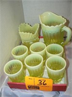 YELLOW GLASS PITCHER AND 6 MATCHING GLASSES,