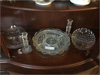 Assorted Glass Pieces on Bottom Shelf