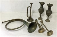 Various decorative brass items.