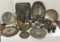 Vintage silver plated items and glass bottles.