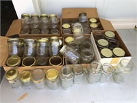 Large Lot of Canning Jars, most with lids