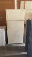 Refrigerator/freezer. Working/cooling. Needs a
