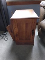 End table with side rack/holder, and its contents