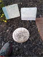 Garden plaques and a stepping stone
