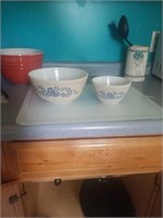 Pair of pyrex bowls and cutting board. 2.5qt and