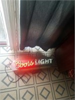 Coors light neon sign.  Works