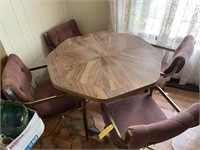 Octagon Table w/4 chairs on rollers