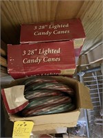 3 Boxes lighted candy canes & Christmas houses