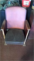 Old movie chair. Wood and metal