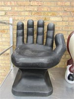 Large Vintage black hand chair.